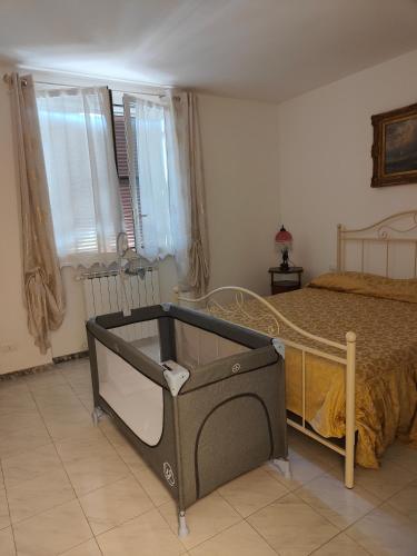 Ένα ή περισσότερα κρεβάτια σε δωμάτιο στο Riva al mare