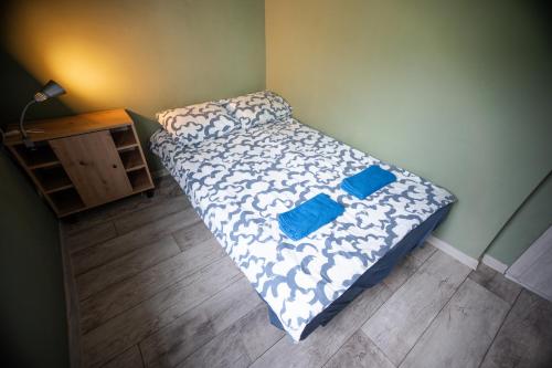 Ένα ή περισσότερα κρεβάτια σε δωμάτιο στο Apartamenty Golden Times Kowalska 8