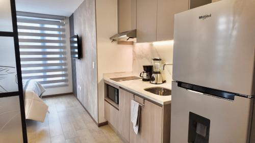 Nhà bếp/bếp nhỏ tại Modern Studio close by La Carolina Metro station