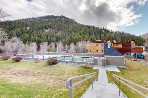 a house on a hill with a swimming pool at Mountain Magic in Ketchum