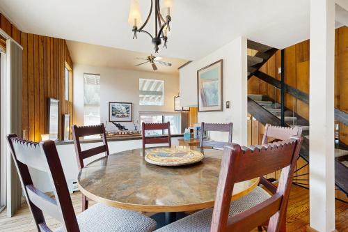 a dining room with a table and chairs at Mountain Magic in Ketchum