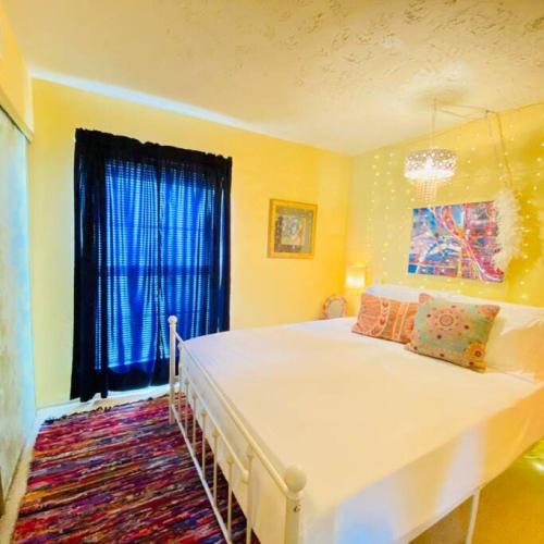 a bedroom with a large bed and a window at The Big Chill on Table Rock Lake in Holiday Island