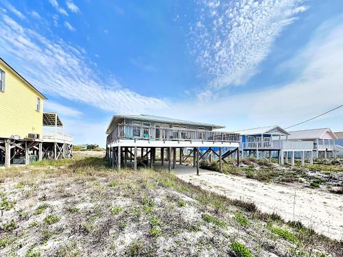 a house on a dock on the beach at Bets Kept Secret in Fort Morgan