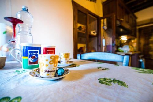 a table with two cups of coffee on it at *La Torre Di Amelia* Nel Cuore Dell' Umbria in Amelia