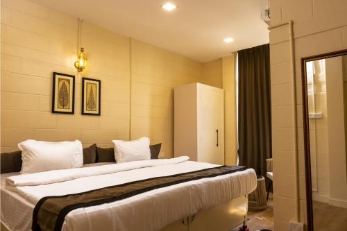Postel nebo postele na pokoji v ubytování Hotel Chandan Heritage