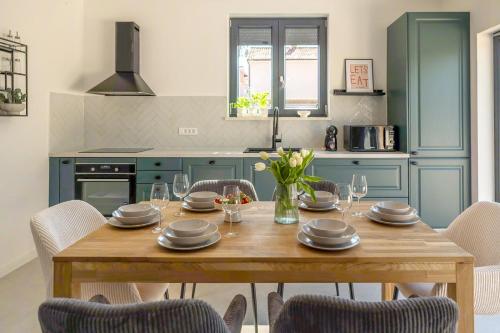 Η κουζίνα ή μικρή κουζίνα στο Apartman Vasianum