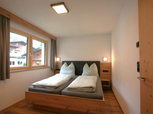 Postel nebo postele na pokoji v ubytování Apartment Kragenjoch by Interhome