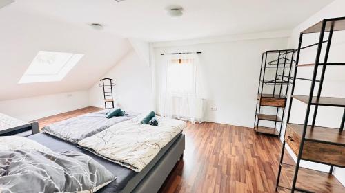 Postel nebo postele na pokoji v ubytování Stylisches Appartement mit Weitblick