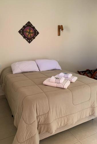 Vila Bonita Guest Houseにあるベッド