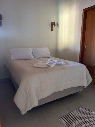 Vila Bonita Guest Houseにあるベッド