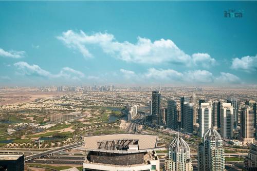 an aerial view of a city with tall buildings at 71st Floor Luxury 1Br Spacious Skyline Balcony in Dubai