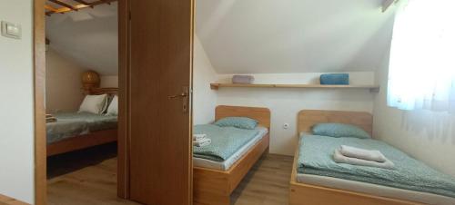 Postel nebo postele na pokoji v ubytování Village Vista