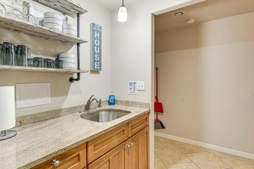 a kitchen with a sink and a counter at Fish and Hike Apartment with Pool Table in Ketchikan! in Ketchikan