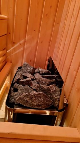a bed sitting in a corner of a room at Premium wellness & spa in Valjevo