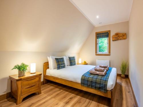 Katil atau katil-katil dalam bilik di Chalet Sandpiper Lodge by Interhome
