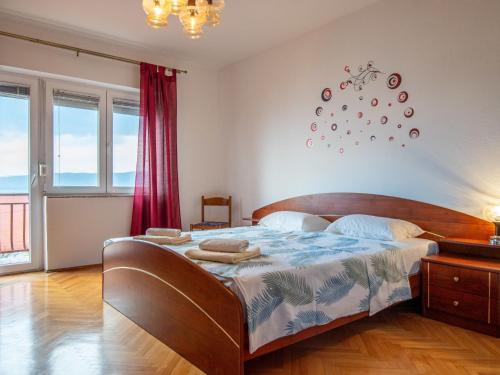 Ένα ή περισσότερα κρεβάτια σε δωμάτιο στο Apartment by Interhome
