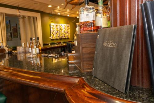 a bar in a restaurant with a counter top at The Marshall House, Historic Inns of Savannah Collection in Savannah
