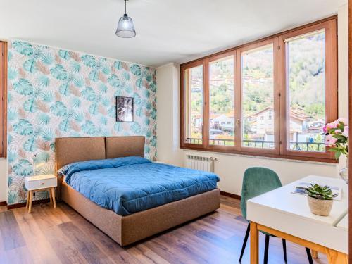 Ένα ή περισσότερα κρεβάτια σε δωμάτιο στο Apartment Piazza San Giuseppe-10 by Interhome