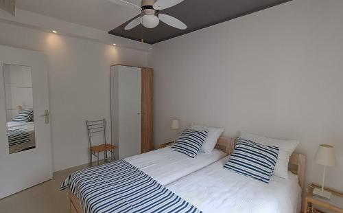 Postel nebo postele na pokoji v ubytování Apartments Grbin