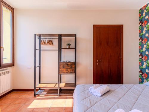 Postel nebo postele na pokoji v ubytování Apartment Piazza San Giuseppe-8 by Interhome