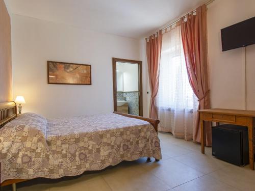 Ένα ή περισσότερα κρεβάτια σε δωμάτιο στο Apartment Bianco by Interhome