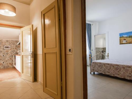 Ένα ή περισσότερα κρεβάτια σε δωμάτιο στο Apartment Bianco by Interhome