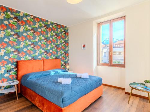 Ένα ή περισσότερα κρεβάτια σε δωμάτιο στο Apartment Piazza San Giuseppe-2 by Interhome