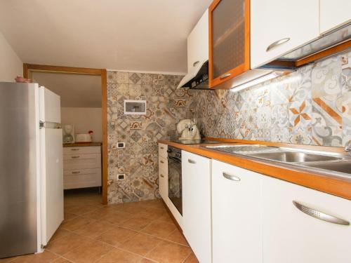 Η κουζίνα ή μικρή κουζίνα στο Apartment Bianco by Interhome