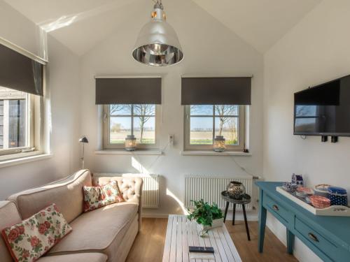 Et tv og/eller underholdning på Apartment Symphonie by Interhome