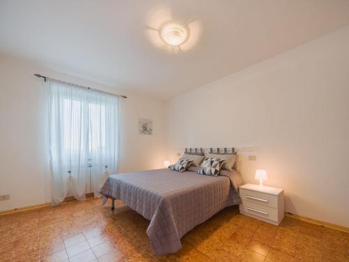 Ένα ή περισσότερα κρεβάτια σε δωμάτιο στο Apartment Viola by Interhome