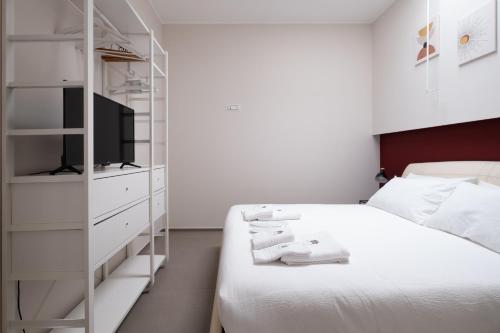 Postel nebo postele na pokoji v ubytování Amas Loft Miccolis