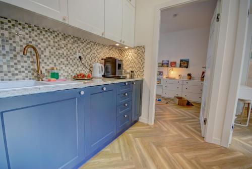 Cucina o angolo cottura di HelApart - Casa Baia