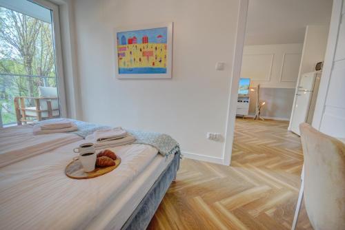 Letto o letti in una camera di HelApart - Casa Baia