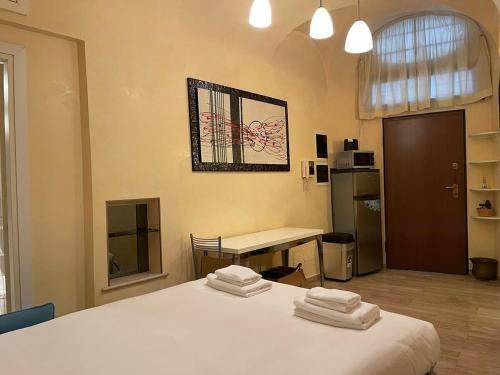 A bed or beds in a room at Piazza di Spagna Apartment
