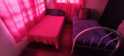 Postel nebo postele na pokoji v ubytování Albergue compartido para damas en boquete