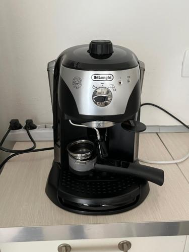 a coffee maker sitting on top of a counter at Sweet HOME GEMMA in Mestre