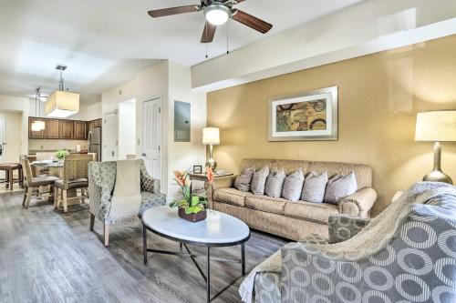 a living room with a couch and a table at Disney Good Neighbor Resort Condo Less Than 4 Mi to WDW! in Orlando