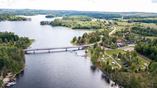 an aerial view of a bridge over a river at Lungsunds Hotell & Camping in Storfors