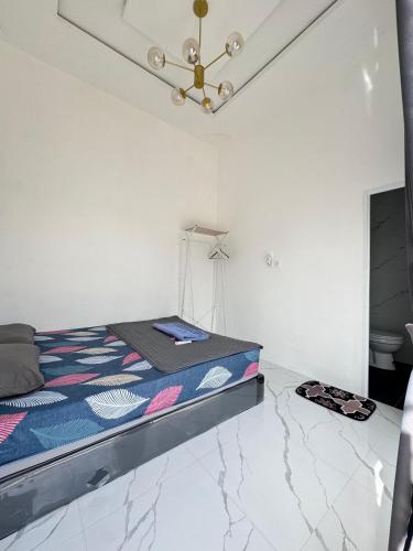 Letto o letti in una camera di Mila Homestay