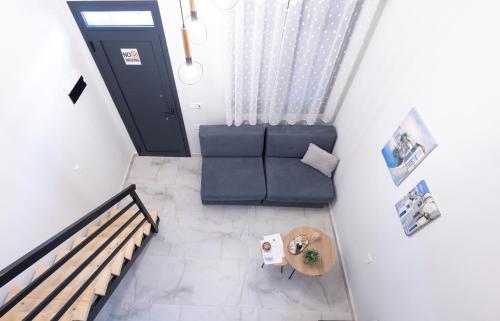 an overhead view of a living room with a couch at Paradise Lofts in Asprovalta