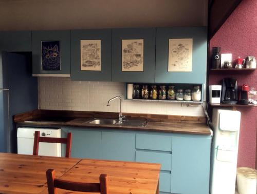 Kuchyň nebo kuchyňský kout v ubytování L'isola Guesthouse