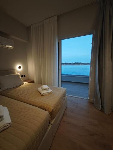 9 Muses Apartmentsにあるベッド