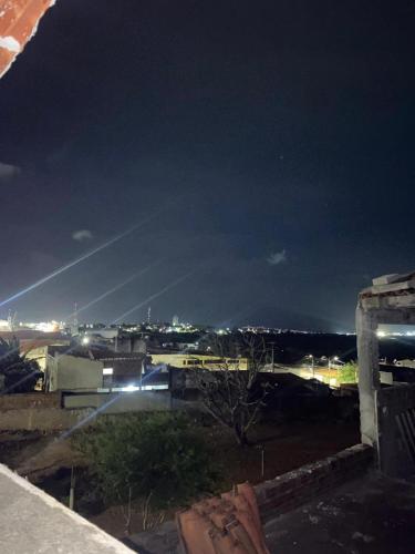 a view of a city at night with lights at Loft ZN Natal próx Norte Shopping Genipabu in Natal