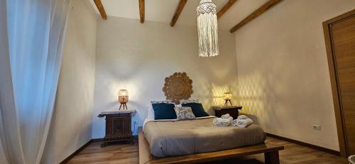 Postel nebo postele na pokoji v ubytování OIKOS Guesthouse & Rooftop