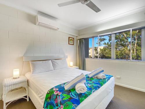 Ένα ή περισσότερα κρεβάτια σε δωμάτιο στο Paradise Apartments 2