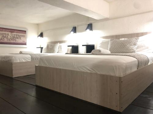 Un ou plusieurs lits dans un hébergement de l'établissement MOKA HOUSE