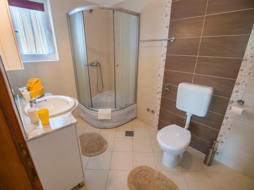 Apartments with parking space Palit, Rab - 24376