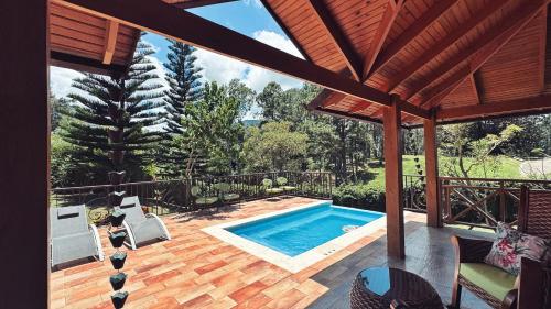 Бассейн в Vista del Campo Country Club & Villas или поблизости