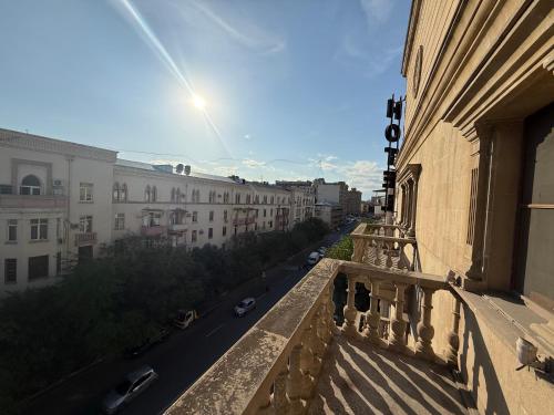 a view of a city street from a balcony at Black Mont İnn Hotel in Baku