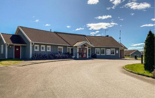 a house with bikes parked outside of it at 2 Bedroom Nice Home In Hok in Hok